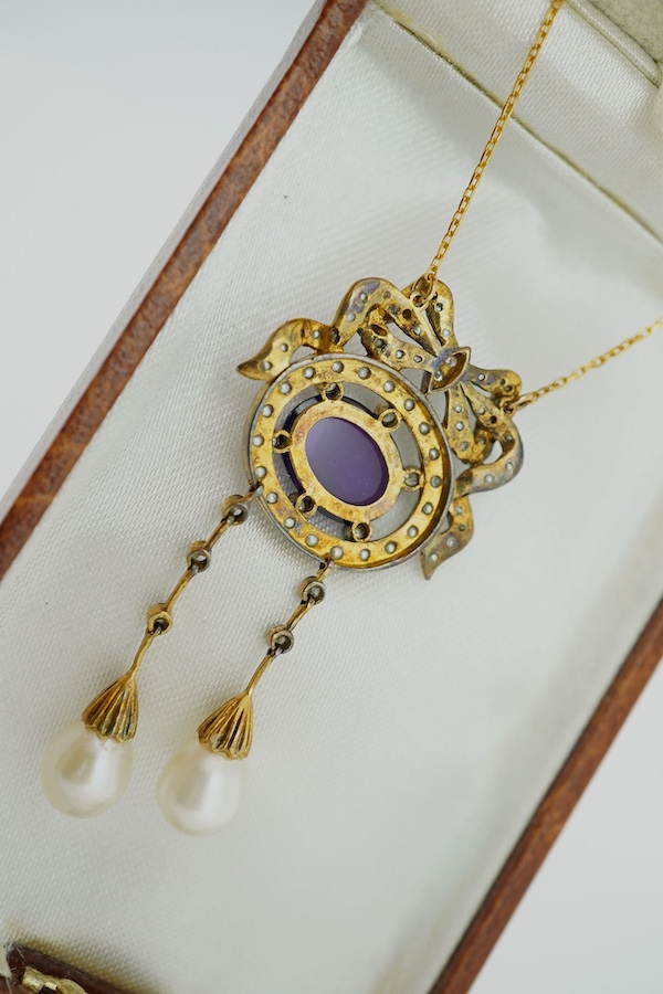 An Edwardian style yellow metal, cabochon amethyst, seed pearl, diamond and cultured pearl double drop pendant, on a 375 chain, pendant 54mm, gross weight 7.5 grams. Condition - fair